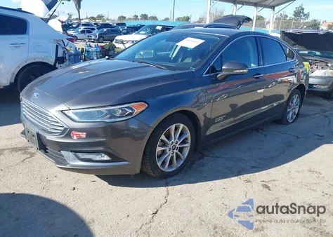 2017 Ford Fusion Energi Titanium from USA, damaged, VIN 3FA6P0SU8HR350502